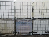 (6) IBC LIQUID STORAGE POLY TANKS W/ METAL BASKETS