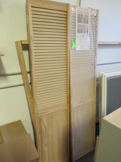 (2) BI-FOLDING WOOD DOORS