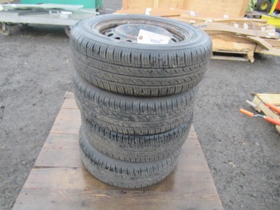 (4) KUMHU P185/65R15 TIRES ON 4 LUG STEEL WHEELS