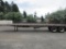 1985 UTILITY 8' X 40' TANDEM AXLE FLATBED TRAILER