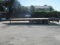 1994 TOWMASTER T-50 TRIAXLE FLATBED TRAILER