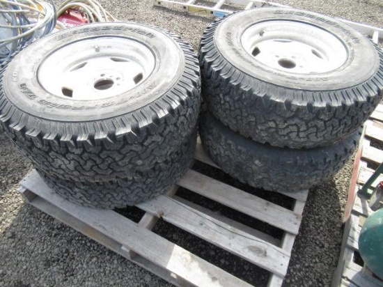(4) BFG A/T 31X10.50R15LT TIRES ON UNIVERSAL 5 LUG WHEELS