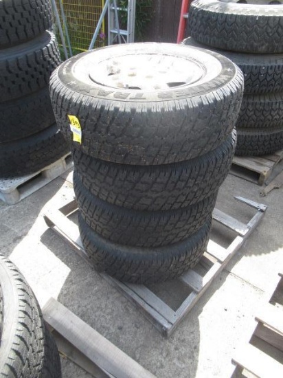 (4) SIGNET P245/75R16 STUDDED TIRES ON JEEP 5 LUG WHEELS, *HOLE IN (1) TIRE