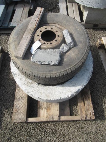 CONCRETE RING & GOODYEAR 235/85R16 TIRE ON STEEL WHEEL