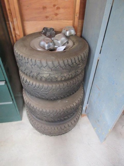 (4) HANKOOK P235/75R15 STUDDED TIRES ON 5 LUG FORD EXPLORER ALUMINUM WHEELS