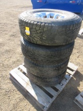 (4) NOKIAN LT285/75R16 STUDDED TIRES ON 8-LUG WHEELS