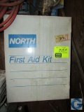 North wall mounted first aid cabinet with contents