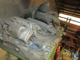 Pallet of tarps and blankets