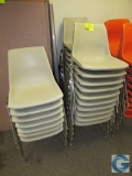 Tan poly stacking chairs