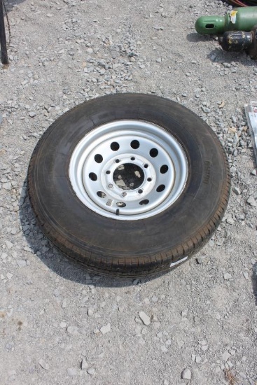 (1) Unused 235/80R16 Tire w/ 8 Hole Rim