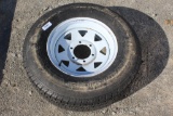 (1) ST225/75R15 Tire w/ Rim