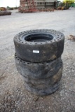 Lot of (4) 30x10x16 Skid Steer Solid Tires w/ Rims