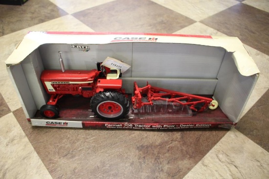 Unused Farmall 706 Toy Tractor w/Plow