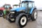 New Holland TM120 MFWD Cab Tractor