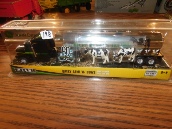 ERTL DAIRY SEMI W/ COWS JD W/ BOX