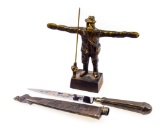 Abu bronze statue & Rossi knife