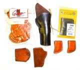Assorted leather holsters