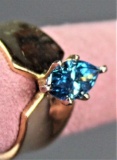 14K ladies ring with irradiated blue marquise diamond