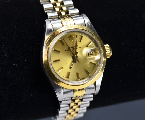 ITEM 5E:18kt. Y GOLD & STAINLESS ROLEX DATE WATCH