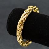 ITEM 20: 18K. Y GOLD ENTWINED HOLLOW TUBE BRACELET