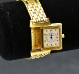 ITEM 40: 18k. BRACELET JAEGER LE COULTRE REVERSO