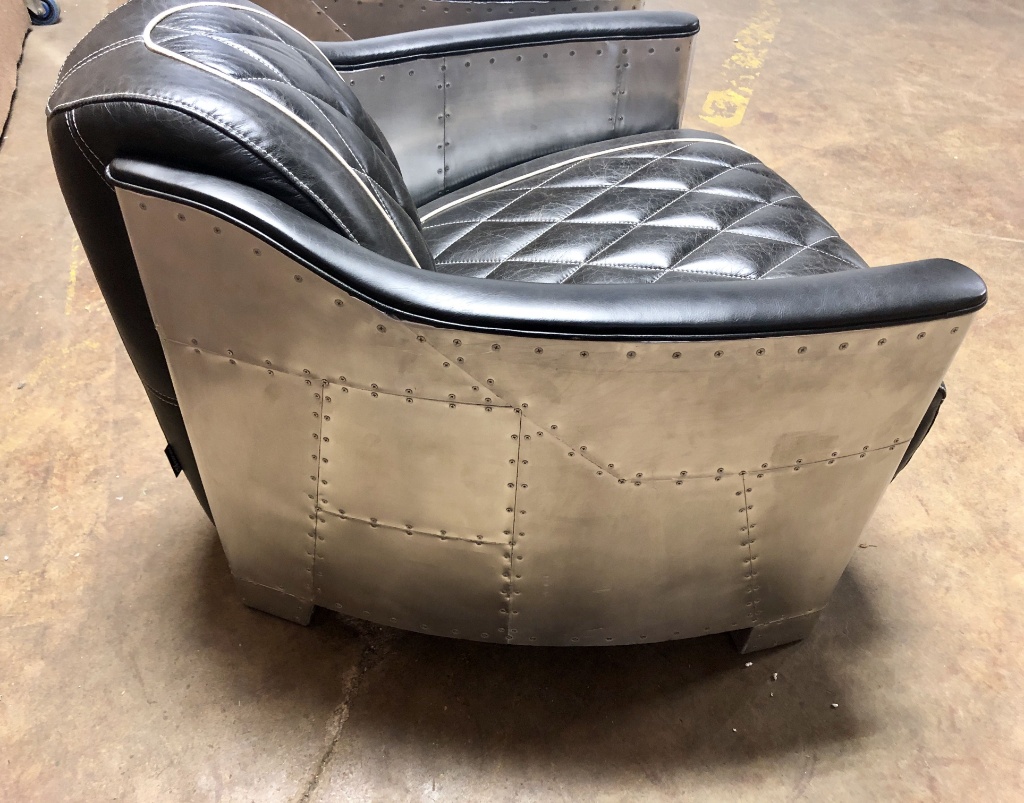 pulaski modern industrial metal and leather aviation accent arm chair