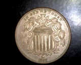 1867 Shield Nickel UNC but has rim damage