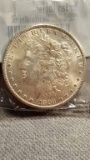 1902-O  Morgan Dollar in Littleton Package UNC 60