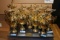 Lot of (12) Brass Base, Plastic Top Karting Trophies.