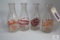 Four WV antique decorated quart glass milk bottles