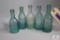 Five semi squat blue glass Pennsylvania soda bottles