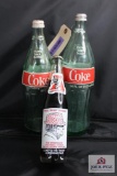 Three Coca cola advertising bottles 10 oz /32 oz /36 oz