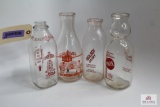 Four WV antique decorated quart glass milk bottles