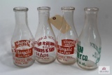 Four WV antique decorated quart glass milk bottles