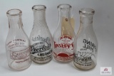 Four WV antique decorated quart glass milk bottles