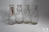 Four Clear WV quart glass milk bottles