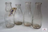 Four Clear WV quart glass milk bottles