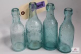 Four semi squat blue glass Pennsylvania soda bottles