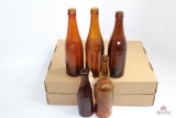 Five amber Pennsylvania crown top beet bottles