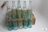 10 blue and clear glass antique beer bottles