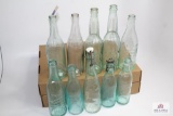 10 blue and clear glass antique beer bottles