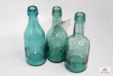 Three green glass semi squat bottles, Henry Kuck Savannah GA/ Fairbanks & Beard Boston Mass/M E