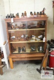 Hand carved wooden book shelf w/ 2 sliding glass doors 5’ x 3’8” x 1’5” contents not included
