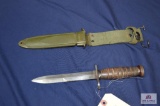 Bayonet with leather handle and scabbord Marked K-M8A1