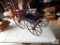 EarlyWooden baby buggy with stenciling and wooden spoke wheels