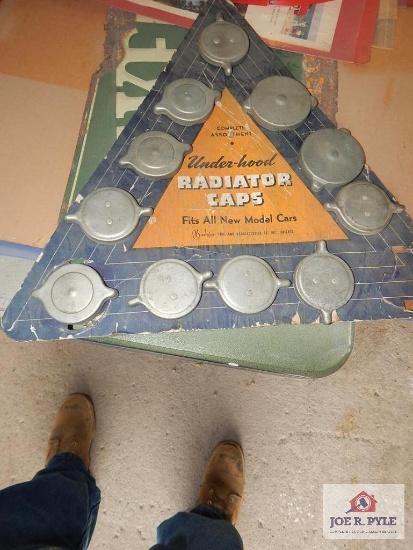Cardboard advertising for radiator cap with radiator cap display