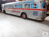 Crysstan tin battery operated Greyhound Bus with litho