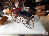 EarlyWooden baby buggy with stenciling and wooden spoke wheels