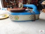 Childs electric metal Victrola tin toy with records