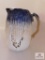 Corn design pitcher with handle/ signed /blue and white 8 inches tall